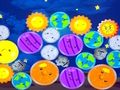Игра Спојте ги среќните планети  онлајн