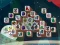 Игра Among Mahjong Tiles онлајн